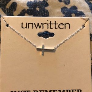unwritten cross necklace